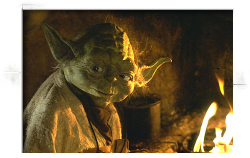 [Yoda sitting by the camp fire, smiling]