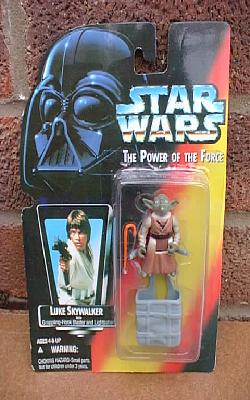 A bootleg Yoda toy on a Luke Skywalker card