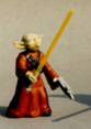 A custom Yoda toy with a lightsaber