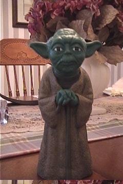 Front view of a vintage Mexican Yoda bank