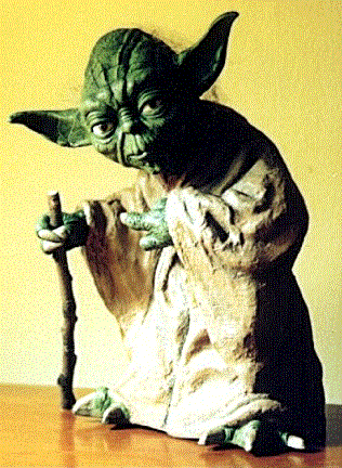 Yoda standing on a table