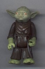 The old Yoda toy out of the package with no accessories