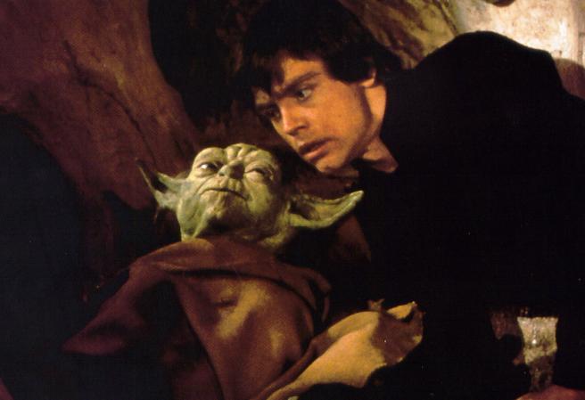 Luke comes in closer to hear Yoda's words of wisdom