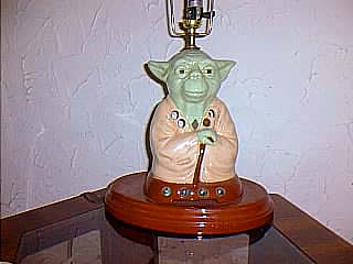 Yoda light up lamp attached to a lamp