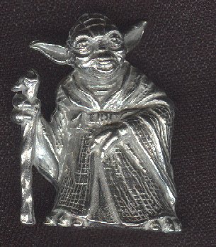 Tiny metal Yoda