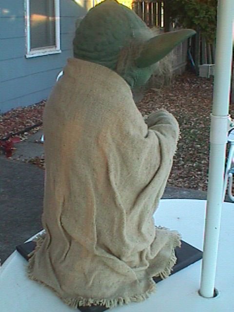 Full back right view of the life-sized Yoda replica