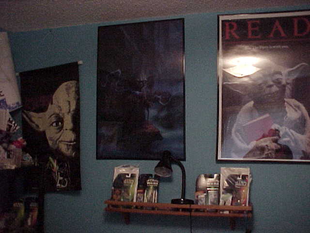More of YodaJeff's Yoda collection including a couple posters and some toys