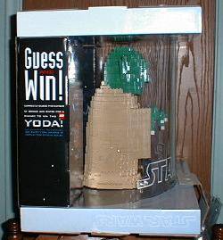 View of the right side of the Target Lego Yoda in his display