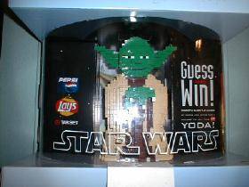 View of the front of the Target Lego Yoda in his display