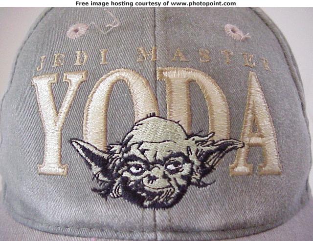 Zoom-in of the logo on the Yoda the Jedi Master hat