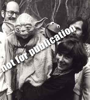 Yoda and his puppeteers with Kermit the Frog