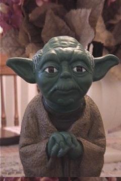 Top front view of a vintage Mexican Yoda bank