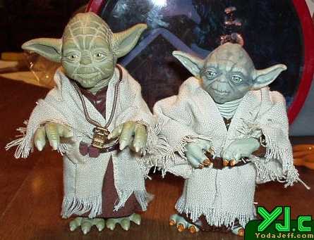 A frontal comparison shot of the two 12' scale Yoda figures