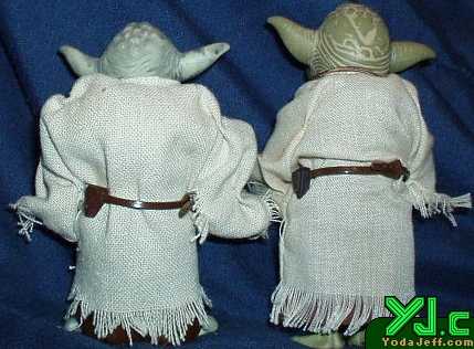 A rear comparison shot of the two 12' scale Yoda figures