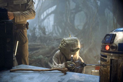 Yoda beating R2-D2 with his cane