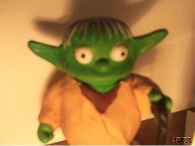 Close up of the head of the custom Ralph dressed like Yoda figure