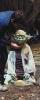 A midget dressed up in a Yoda costume (for filming of Empire Strikes Back) - 171x422