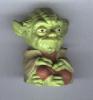 A foreign Yoda figurine - 293x314