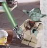 Lego Yoda with green lightsaber - 383x391