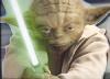 Yoda with his lightsaber extended - 450x327